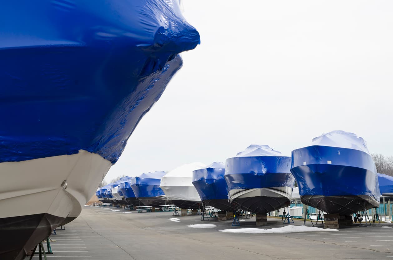 Boats prepared and wrapped for winter storage