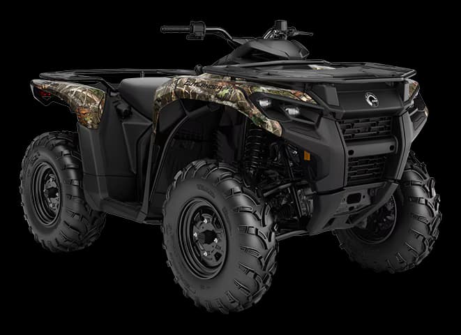 ATV driving through rough terrain