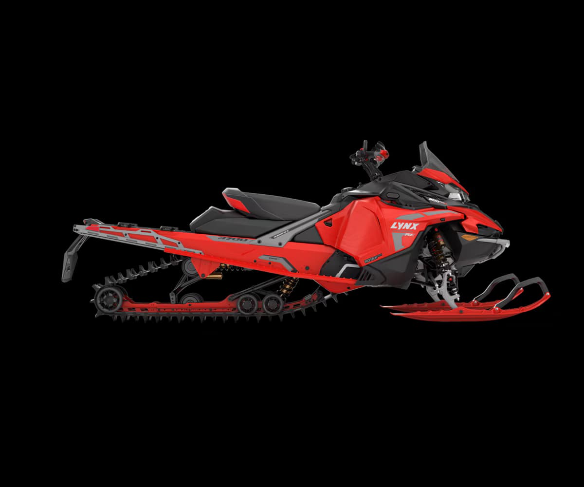 Ski-Doo snowmobile riding through snow